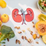 Human kidneys drawing and healthy fresh food on the table